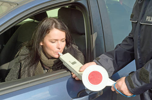 photo depicting clinical tests sobriety state driver by a policeman
